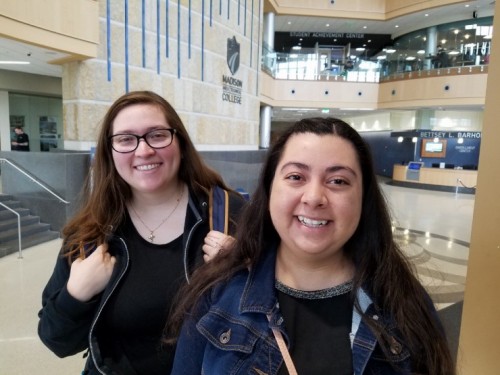 Liz and Nancy Quezada stand together.