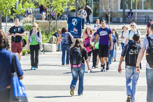 students walking in a crosswalk