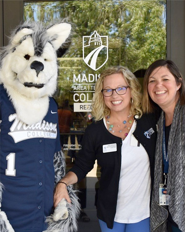 Wolfie with students at Reedsburg campus